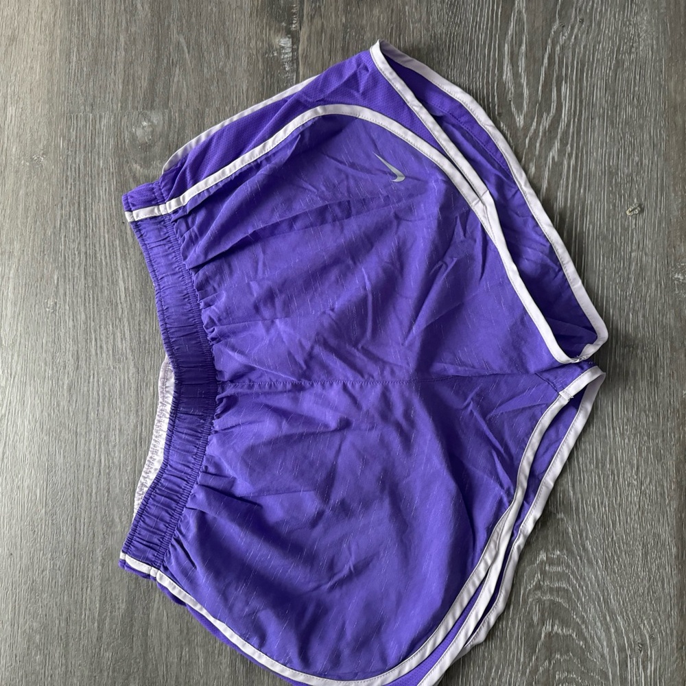 Purple Nike shorts with built in mesh underwear